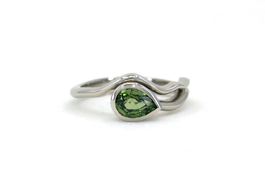 Pear Green Sapphire Platinum Wavy Ring Design