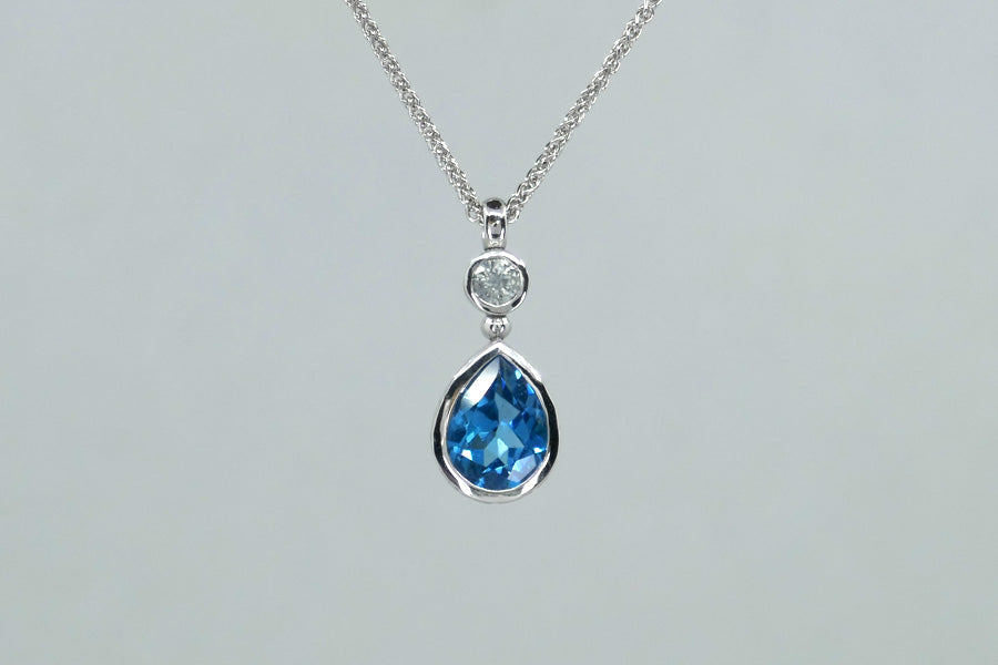 Short Pear Shaped Blue Topaz & White Sapphire 9ct White Gold Pendant