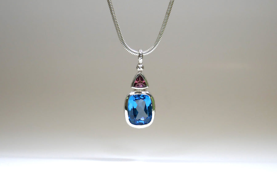 Cushion Blue Topaz & Trillion Red Tourmaline Silver Drop Pendant
