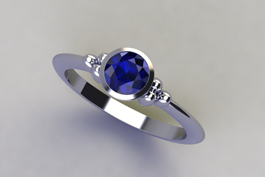 Bead Design White Gold Ring with Round Sapphire