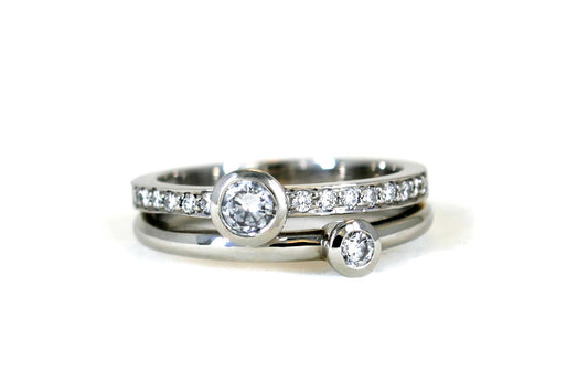 Two Stone Diamond Pave Set Double Band Platinum Ring Design
