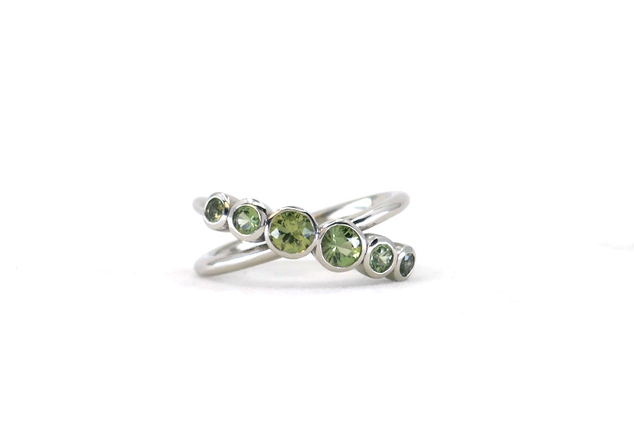 Crossover Six Stone Green Sapphire Platinum Ring Design