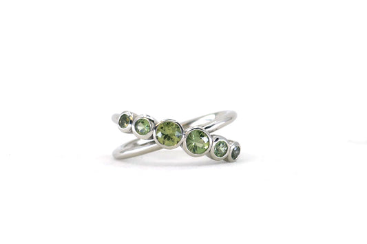 Crossover Six Stone Green Sapphire Platinum Ring Design