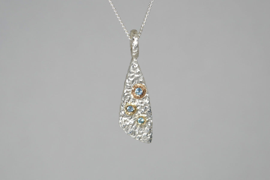 Burr Design Silver & 18ct Gold Blue Topaz Pendant