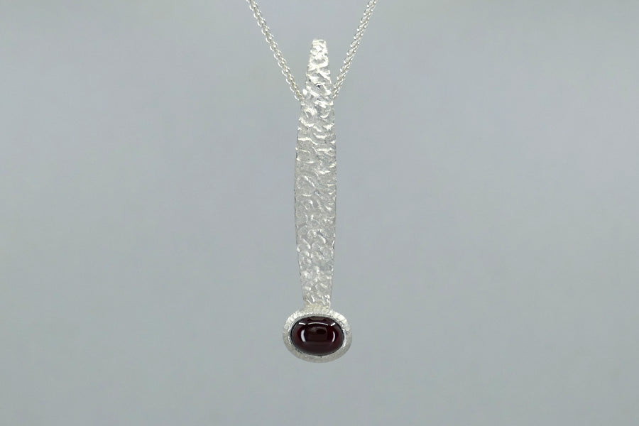 Burr Patterned Silver Necklace with Oval Cabochon Garnet