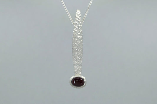 Burr Patterned Silver Necklace with Oval Cabochon Garnet