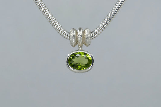 Oval Peridot Triple Bead Design Silver Necklace