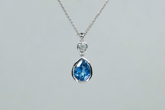Short Pear Shaped Blue Topaz & White Sapphire 9ct White Gold Pendant