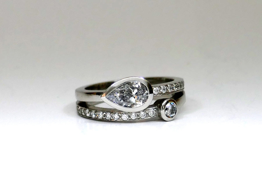 Pear & Round Diamond Pave Set Double Band Platinum Ring Design