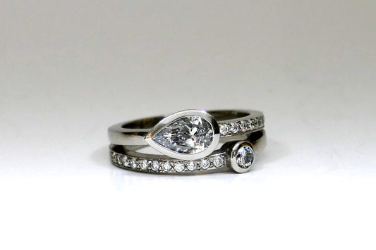 Pear & Round Diamond Pave Set Double Band Platinum Ring Design