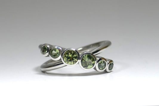 Crossover Six Stone Green Sapphire Platinum Ring Design