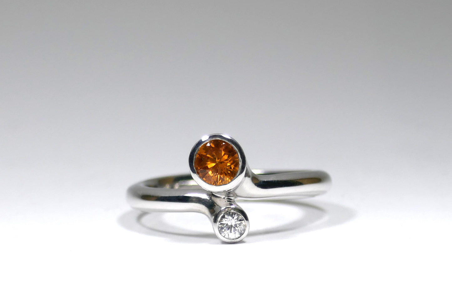 Offset Two Stone Orange & White Sapphire Silver Ring