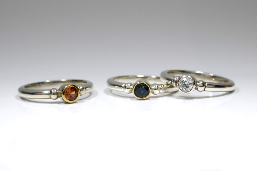 Sapphire & Diamond, Silver & Platinum Round Stone Ring Designs