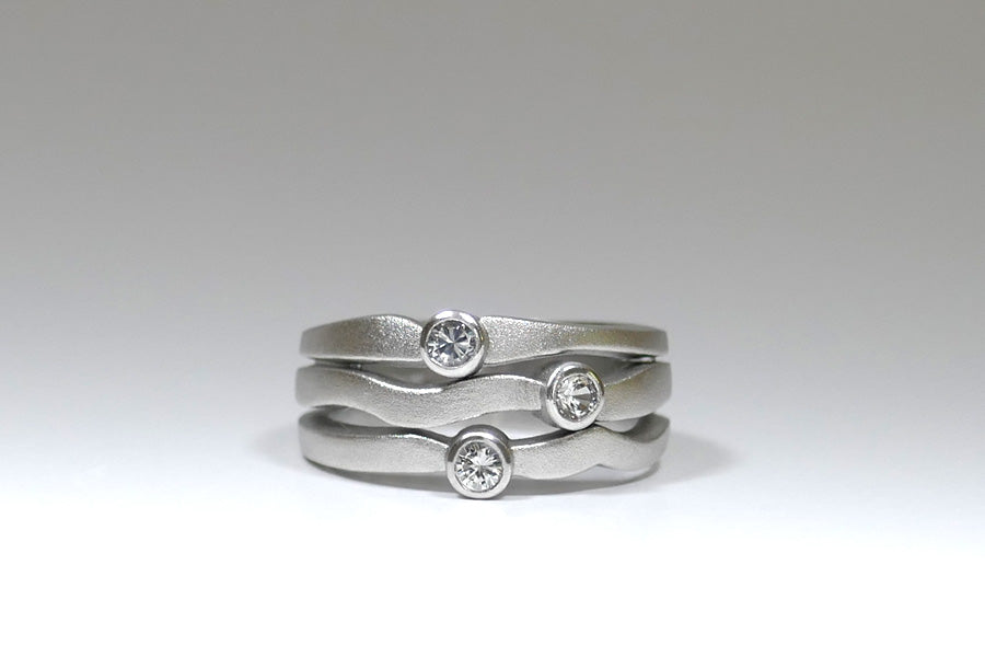 Round Three Stone Brilliant Cut Diamond Platinum Ring