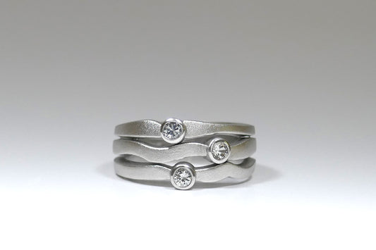 Round Three Stone Brilliant Cut Diamond Platinum Ring