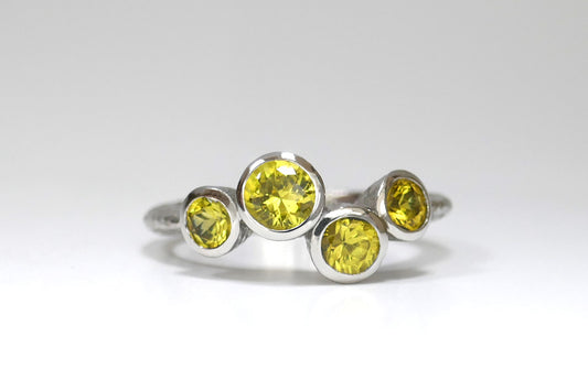 Four Stone Yellow Sapphire Platinum Ring