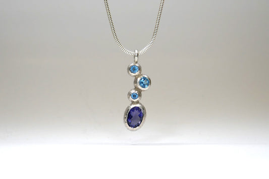 Oval Iolite & Blue Topaz Silver Quirky Pendant Design
