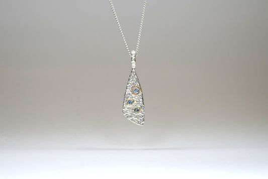 Burr Design Silver & 18ct Gold Blue Topaz Pendant