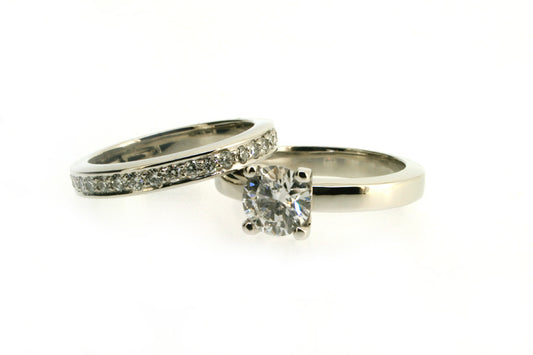 Round Brilliant Cut Diamond Platinum Engagement & Diamond Set Wedding Rings