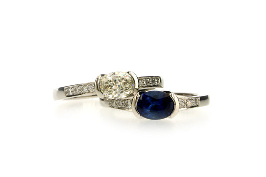 Oval Diamond & Sapphire Platinum Engagement Rings with Diamond Set Shoulders