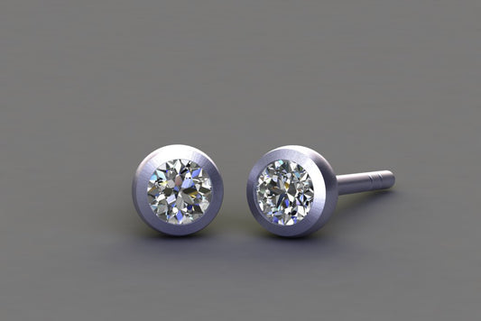 Round Brilliant Cut Diamond Platinum Ear Stud Design