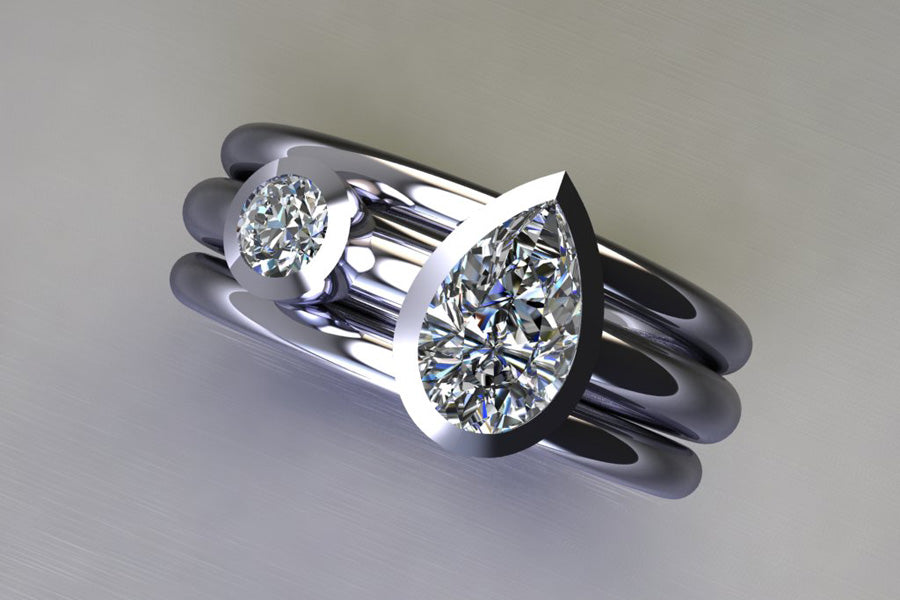 Pear Cut Diamond & Round Brilliant Cut Diamond Platinum Ring Design