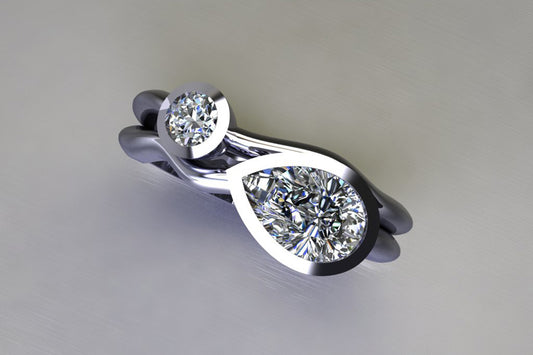 Pear Diamond & Round Brilliant Cut Diamond Platinum Ring Design