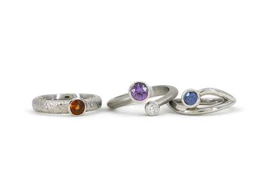 Platinum Sapphire & Garnet Round Stone Ring Designs