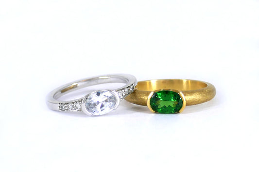 Oval Cut Diamond & Tsavorite Platinum & 18ct Gold Rings